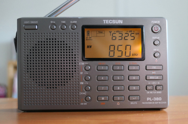 Tecsun PL-380 AM/FM/shortwave radio, tuned to KOA(AM) Denver