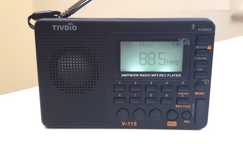 Tivdio V-115 AM/FM/SW DSP radio, tuned to KQED-FM