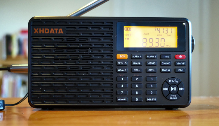 XHDATA D-109WB AM/FM/weather band radio and media player, tuned to 89.3 KUVO in Denver