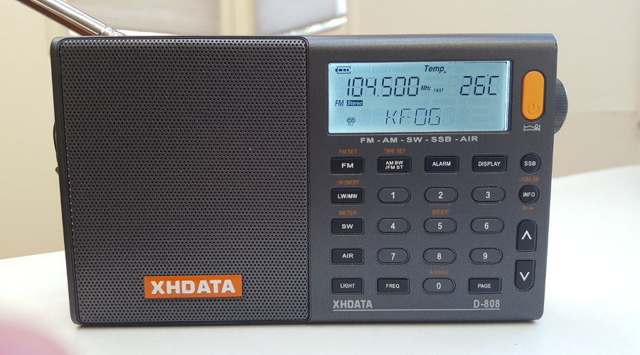 XHDATA D-808 AM/FM/SW/air band DSP radio, tuned to KFOG(FM)