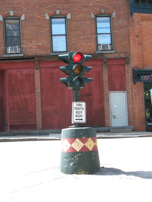 Traffic signal in the middle of Main and Churchill Streets in Beacon, New York, looking toward Churchill