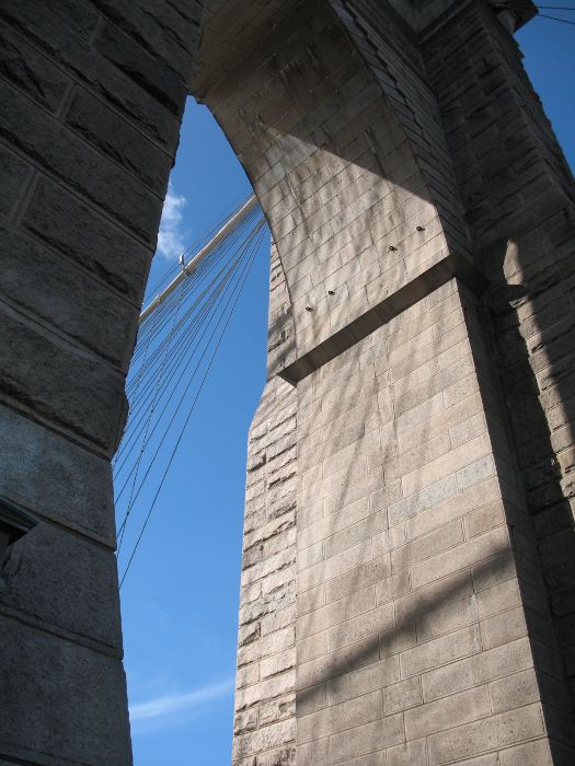 Close-up view of one of the arches of the Brooklyn Bridge
