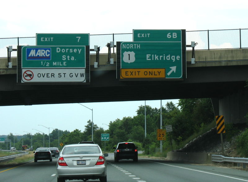 Commuter rail station advance exit sign on Maryland 100 at US 1