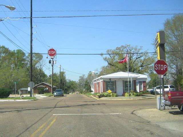 Overhead four-way stop sign in Poplarville, Mississippi