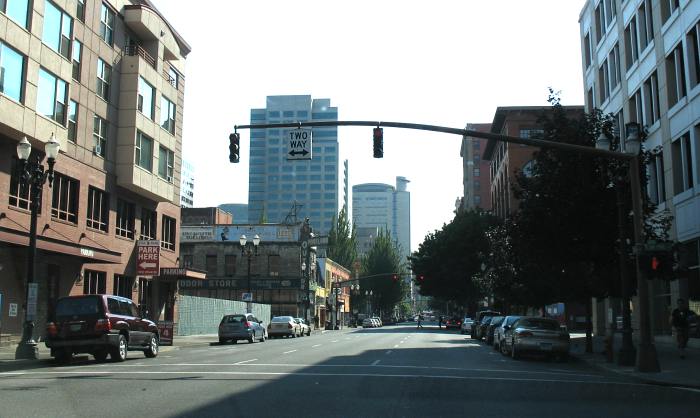 Sign indicating two-way cross traffic in downtown Portland, Oregon
