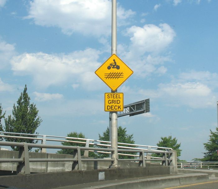 Warning for motorcyclists at the west end of the Hawthorne Bridge in Portland, Oregon